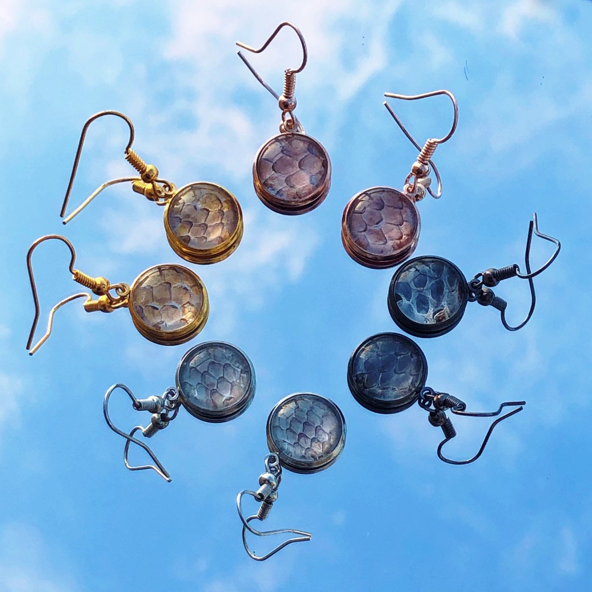 row3n_'s tweet photo. I’ve started making some bits with snake skin ethically sourced from my own personal collection. Jewellery, epoxy resin &amp; trinkets. I’ve got so many ideas for things to come 🖤 https://t.co/hc203xOx7v https://t.co/B7dsWMG81L