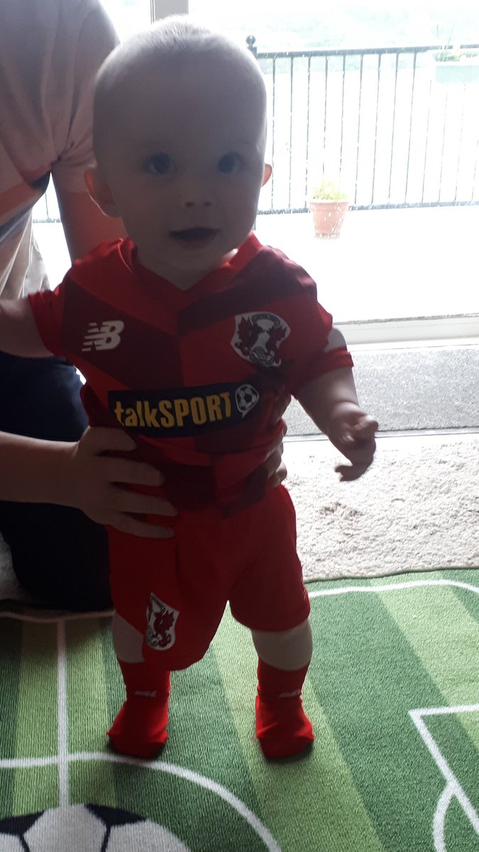 AndrewJKiely's tweet photo. My son’s first @leytonorientfc kit. Contender for ‘Youngest Overseas Fan’ perhaps??! All the way from County Cork! @SevenkingsO @LOFCSupporters https://t.co/wRLQ6EvGZM