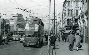 1950’s Holloway Road, looking North outside what would be Iceland today. It’s always interesting to zoom into these photos to explore the multiple narratives on display.