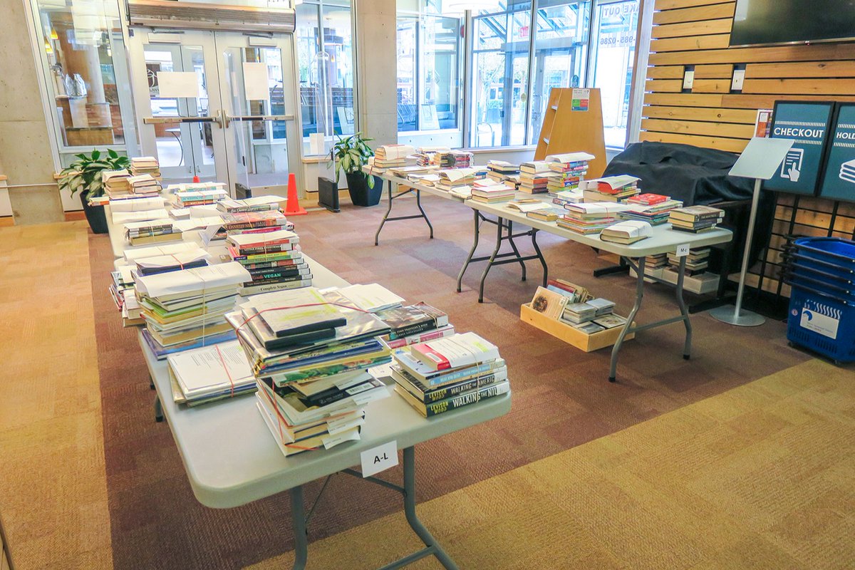 nvdpl's tweet photo. Our spaces have transformed into Library Takeout fulfilment centres! Check out all of these orders being prepared for you, #northvan! Library staff are working hard to get your materials to you as soon as possible. We appreciate your patience as we try to keep up with demand! https://t.co/NVf5RZU8YS