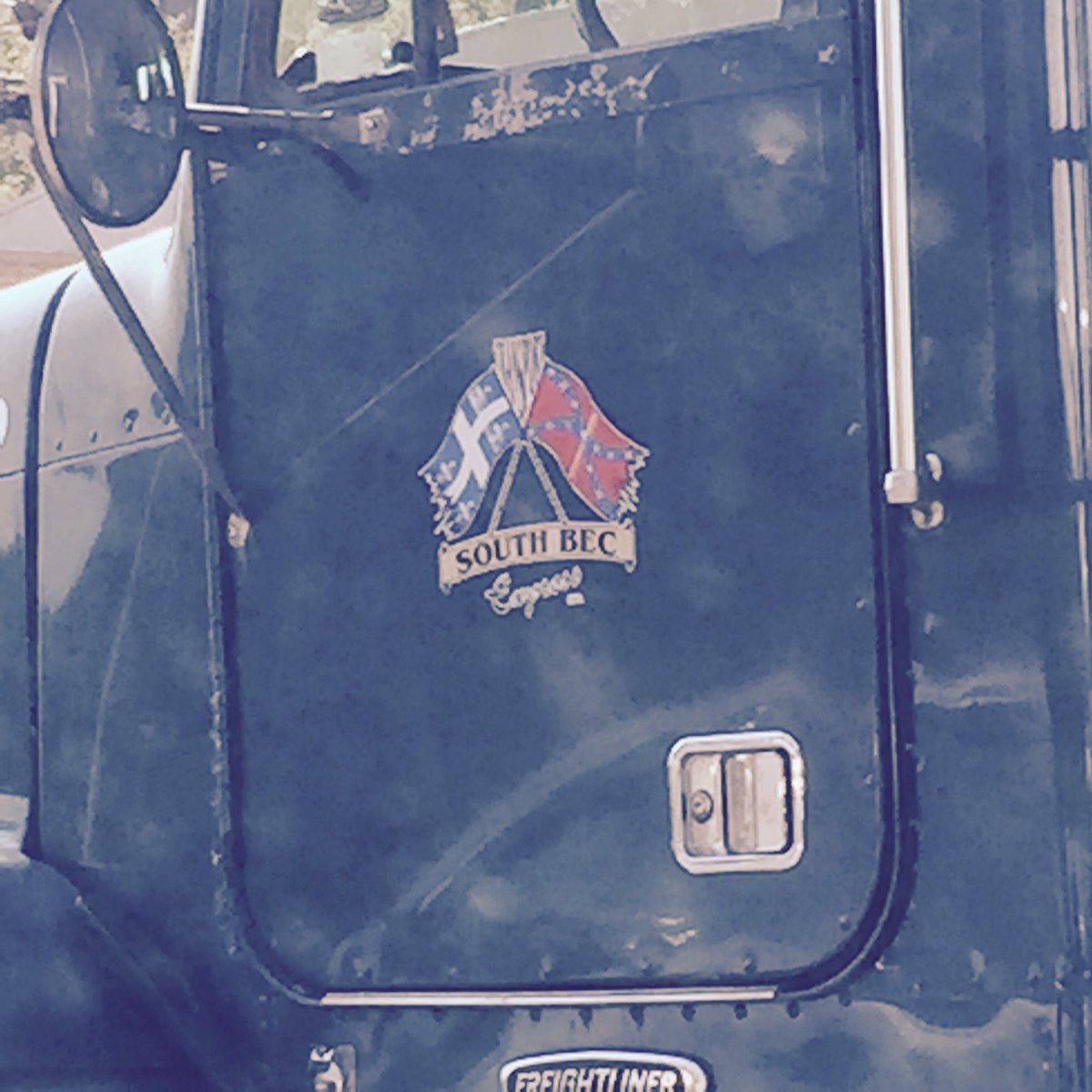 colecarter_'s tweet photo. @willystaley They do actually like the Confederate flag though. Saw a truck with this symbol on the door and mudflaps on the way to Montreal. https://t.co/8j9TCMZRAY