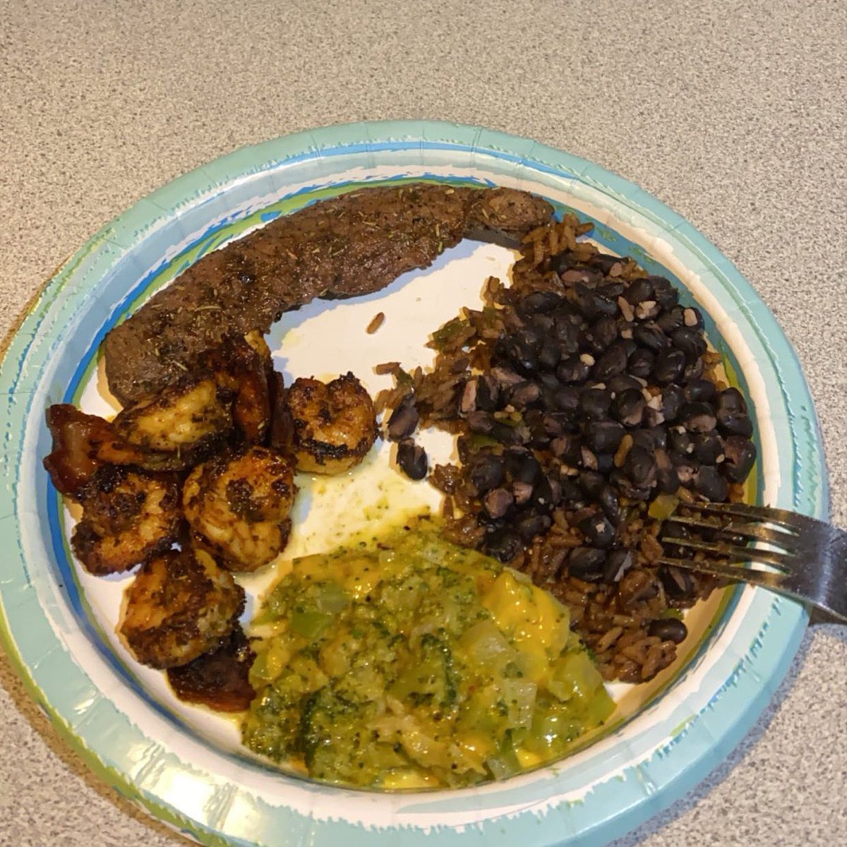 Talmadge12's tweet photo. New York strip, pan seared shrimp, black beans over fried rice, broccoli &amp; cheese https://t.co/WpnzRaf2PI