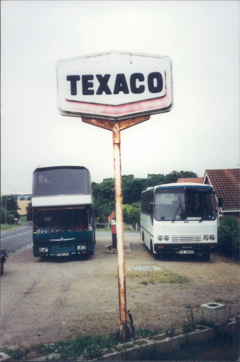 Day 132 of  #petrolstationsTexaco/Valiant, Smiths Coaches, Corby Glen, Lincs 1999  https://www.flickr.com/photos/danlockton/16082699060/  https://www.flickr.com/photos/danlockton/16269737972/Another kind of "historic Texaco"—70s sign, with a dramatic Neoplan Skyliner. Texaco's short-lived secondary brand, Valiant, is evident on the pump.