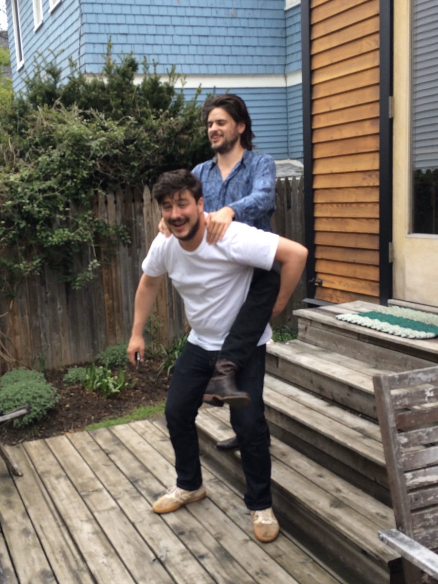MumfordAndSons's tweet photo. Voice of an angel, sure, but did you know Marcus is also an Olympian piggy-back provider? 5 years since #WilderMind and theyโve only become sturdier and more comfortable, delightful on a day like today. Watch out Atlas, this is how you do it. #WinstonWednesdays https://t.co/WqFbmFhY6P