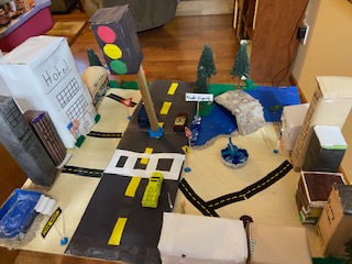 Wow!  Here is Kenzie's urban community.  She learned more about urban areas and then made this awesome model from materials around her house!