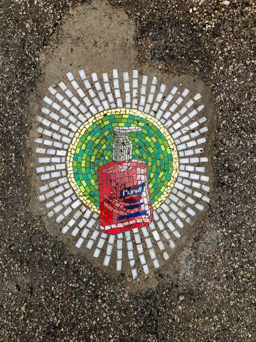 lonelyplanet's tweet photo. Chicago artist turns potholes into unbelievable pandemic-themed mosaics - https://t.co/Afr2qOoJv4 https://t.co/63Xxi6j1zC