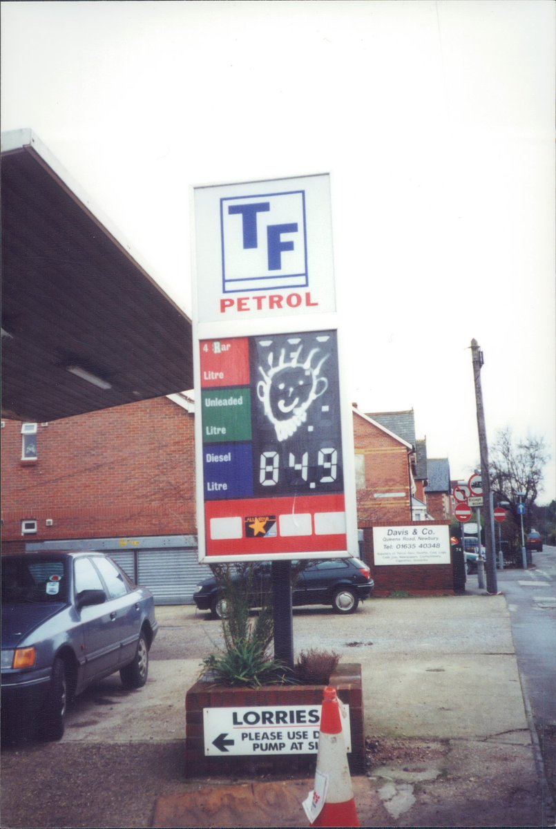 Day 133 of  #petrolstationsTF, Queen's Road Garage, Newbury, Berks, 2000  https://www.flickr.com/photos/danlockton/15650167053/A friendly face on the sign! Now replaced by an ATS, this garage down a side street in Newbury was a one-off brand (not sure what TF stood for) run by a company called Lastshare Ltd