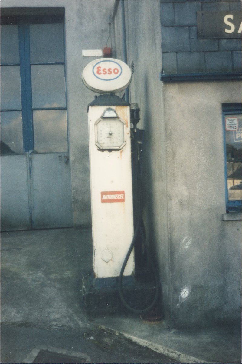 Day 135 of  #petrolstationsEsso, D&D Motors, Modbury, Devon 1994  https://www.flickr.com/photos/danlockton/16069991720/  https://www.flickr.com/photos/danlockton/16231470866/Wonderful array of old pumps—a '30s Avery Hardoll & 4 '60s Wayne—at this Peugeot garage on a sharp bend in a south Devon village. Garage still going; pumps have gone