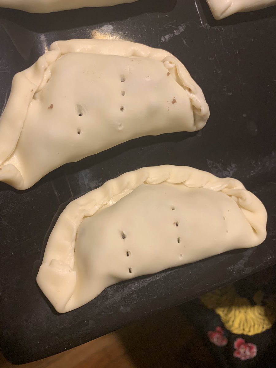 Next with a fork puncture it with a fork at the top so they don’t blow up in the oven. Then followed with an egg wash. After that they are ready for the oven!