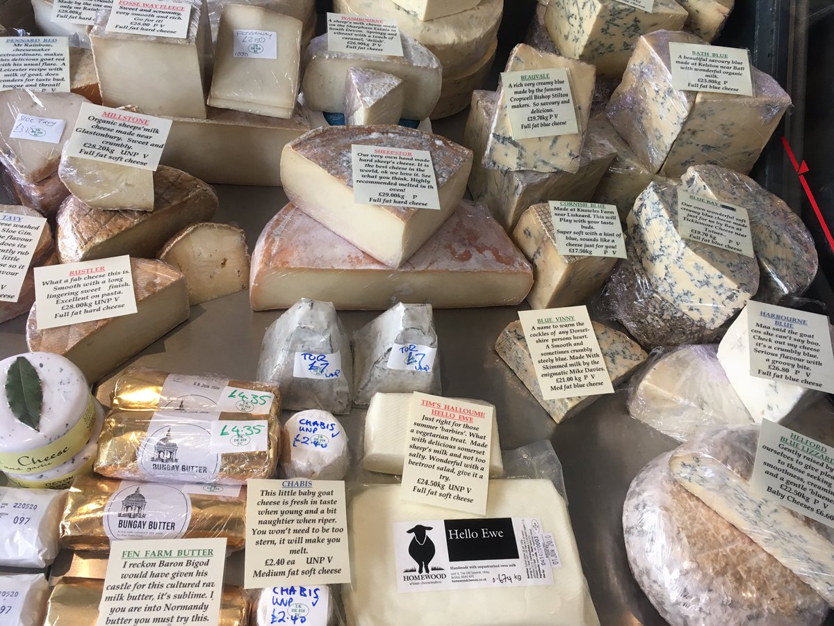 CountryCheeses's tweet photo. Here’s one of our chillers in Topsham prepped for Saturday. How many superstar cheese makers can you spot? Also take a moment to relish Gary’s lyrical labels 😂 #BritishCheeseWeekender https://t.co/hABbHQJ8QD