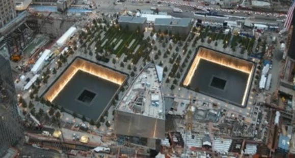 This of course is the reason that the 9/11 memorial is a cut out of two black cubesThere's even a new World Trade Center Performing Arts center in construction that is a cube.The main feature of the memorial area is the"Occulus"Which means "an eye", and it's shaped like 1