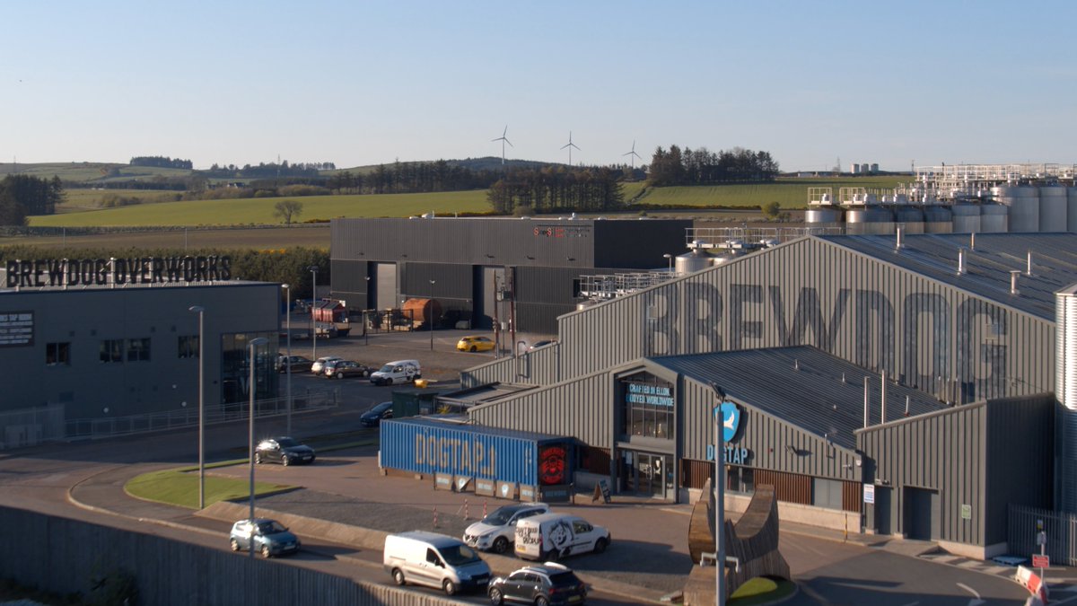 JamesBWatt's tweet photo. Good morning from @BrewDog HQ.

Our brewery will soon be directly powered by the 3 wind turbines you see in this picture. 

Providing us with 2.4 megawatts of clean electricity to power our entire brewery. 

#brewdogtomorrow https://t.co/KQYyBfo58V