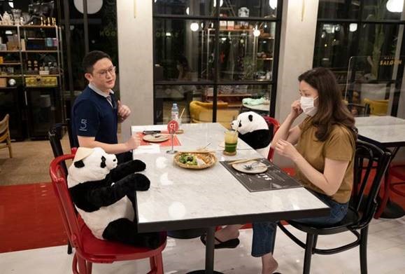Stuffed panda seat fillers enforcing social distancing in Bangkok.