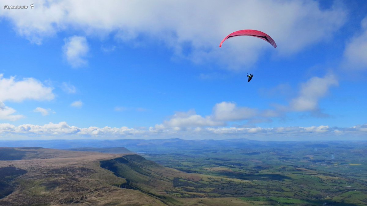 FlybubbleTeam's tweet photo. Flybubble Nancy on glide towards the Brecon Beacons in SE Wales from Hay Bluff with Carlo. Gin Explorer review on https://t.co/vPVm9YQ2DT #paragliding #paraglide #parapente #gleitschirm #paragleiten #freeflight #freeflying #vollibre #vuelolibre #xcflying #crosscountryflying https://t.co/BcS5pveLx0