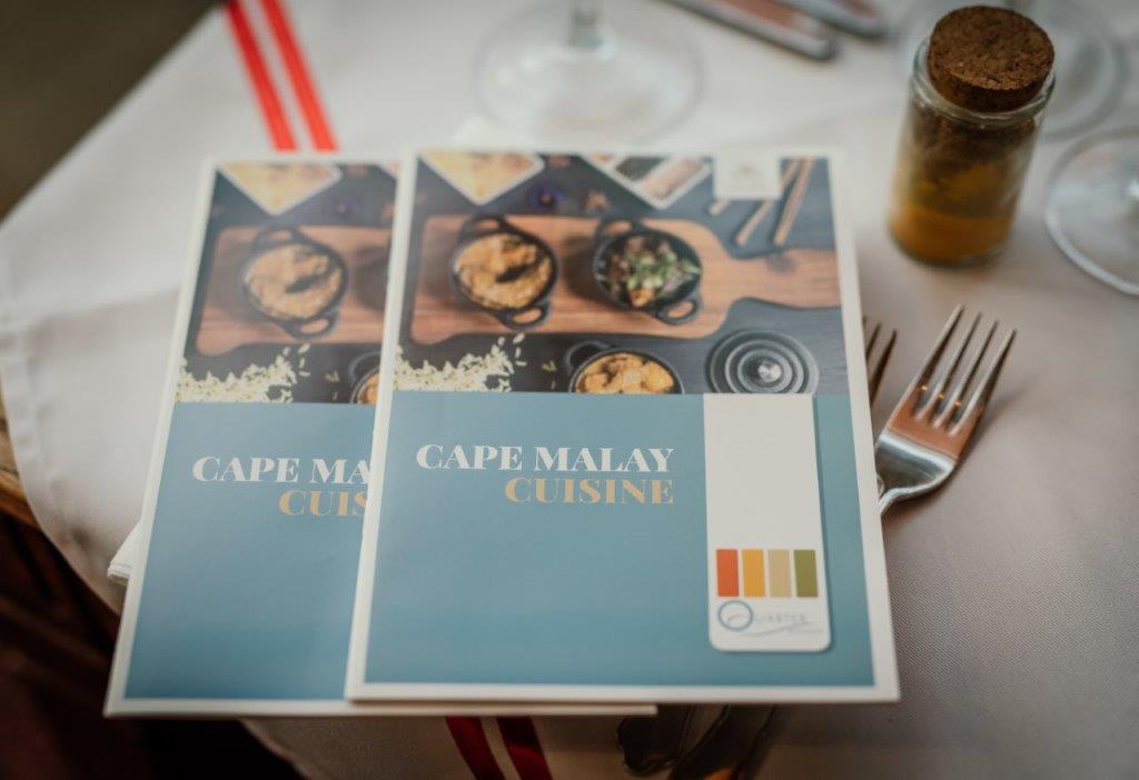 Vrouekeur's tweet photo. Met inperking is dit tyd vir nuwe resepte. Sjef Wade Kearns van The Quarter Kitchen in The Portswood Hotel, stel sy Kaap-Maleise resepteboek beskikbaar én jy kan ’n ete vir 2 wen. Gebruik #CookingWithQuarterKitchen op sosiale media as jy resepte uit boek maak. @ThePortsWoodSA https://t.co/CrOWxBNRfB