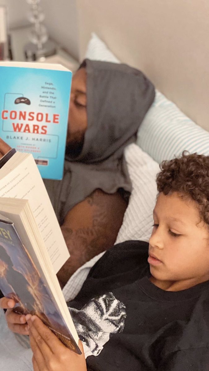 fitzbtwnshelves's tweet photo. Like father, like son 💕📚 #STABReadsAtHome @StAnnesBelfield @coachmhagans https://t.co/0tmPFfrCN4
