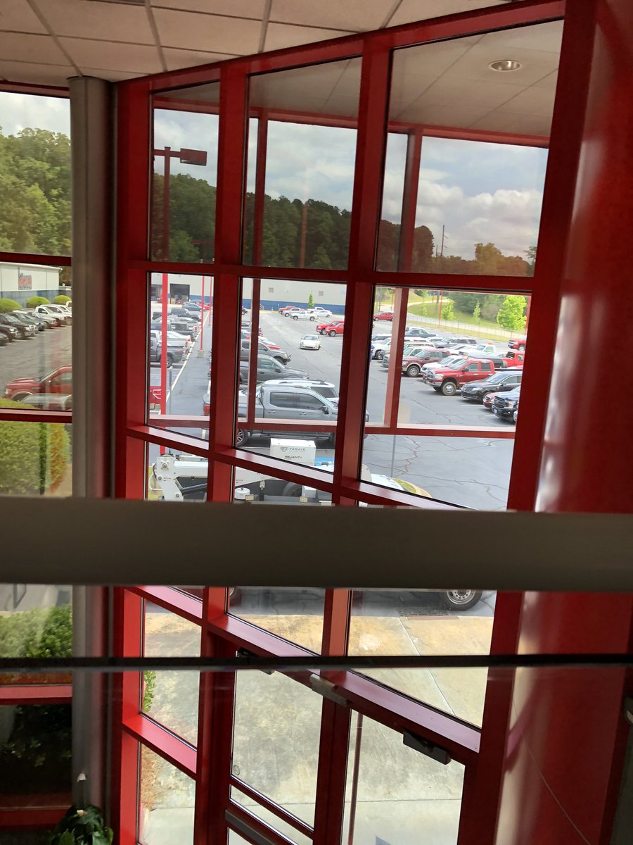 stumpybushman's tweet image. The parking lot isn’t too empty because we’re needed #EssentialWorkers #fuckcovid19 #working