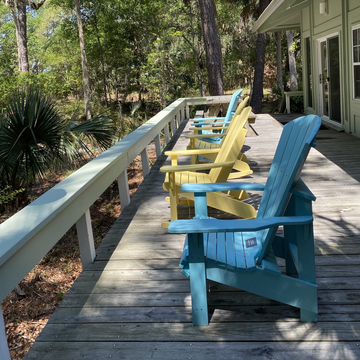 Deck, rails, and chairs pressure-washed and rails have a fresh coat of paint. The Prayer Center is ready to welcome visitors again.