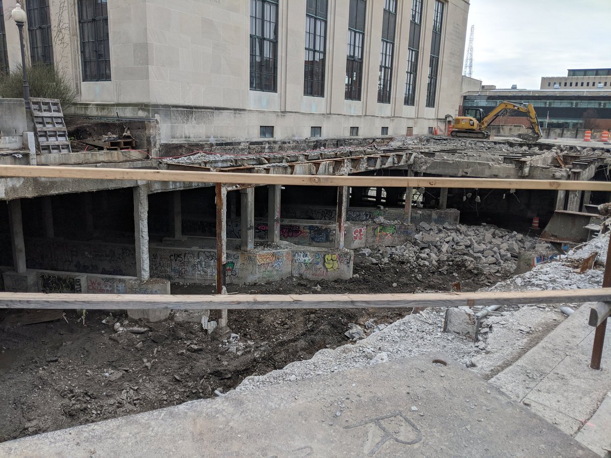 RocCityLibrary's tweet photo. #Construction update! Demolition and old concrete removal continues. The water main to Rundel is being replaced. #RochesterPublicLibrary #ROCtheLibrary #ROC https://t.co/wy8nOzxrqV