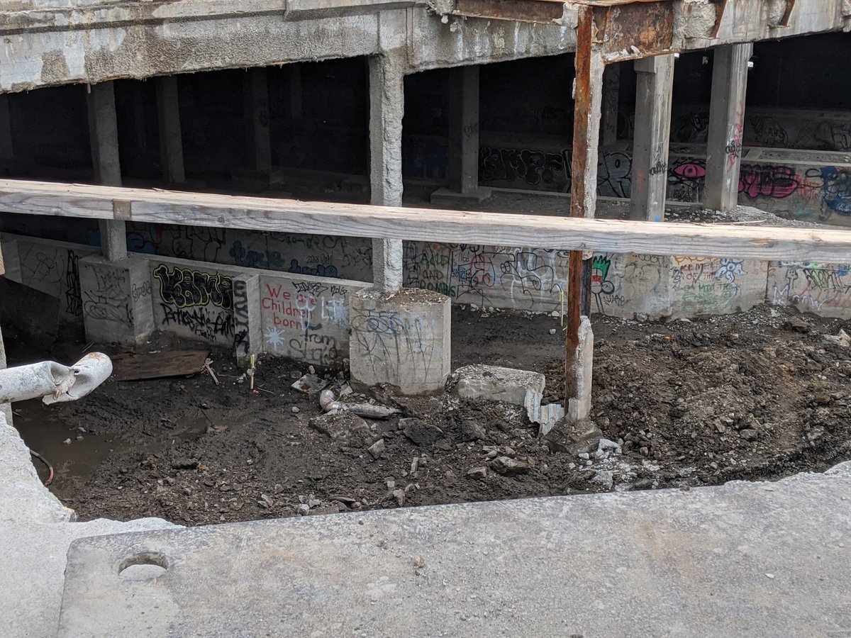 RocCityLibrary's tweet photo. #Construction update! Demolition and old concrete removal continues. The water main to Rundel is being replaced. #RochesterPublicLibrary #ROCtheLibrary #ROC https://t.co/wy8nOzxrqV