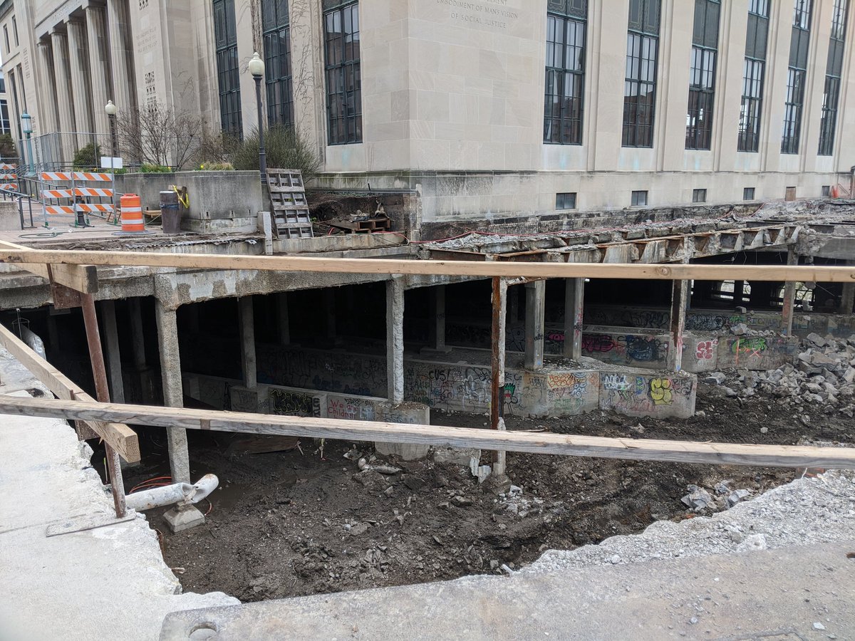RocCityLibrary's tweet photo. #Construction update! Demolition and old concrete removal continues. The water main to Rundel is being replaced. #RochesterPublicLibrary #ROCtheLibrary #ROC https://t.co/wy8nOzxrqV