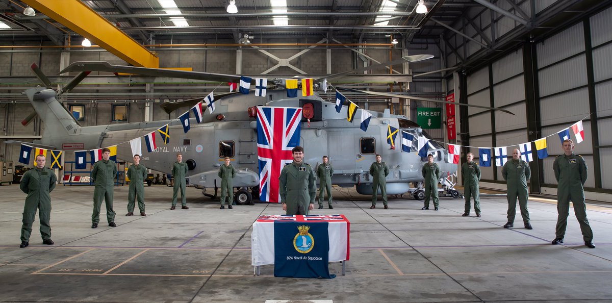 RNASCuldrose's tweet photo. RNAS Culdrose Wings Parade #COVID19 style: no immaculate uniforms, no visiting admirals, no marching band, parade, watching families &amp; absolutely no handshakes. But it still remains: these 12 Merlin aircrew have completed years of training to serve frontline @RoyalNavy Well done https://t.co/aaEZb4kNyO