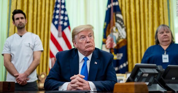 CNNPolitics's tweet photo. President Trump contradicts a nurse he's honoring during a National Nurses Day event in the Oval Office, insisting there are no PPE shortages https://t.co/5lL4sAk90p https://t.co/IOOYwNgb6M