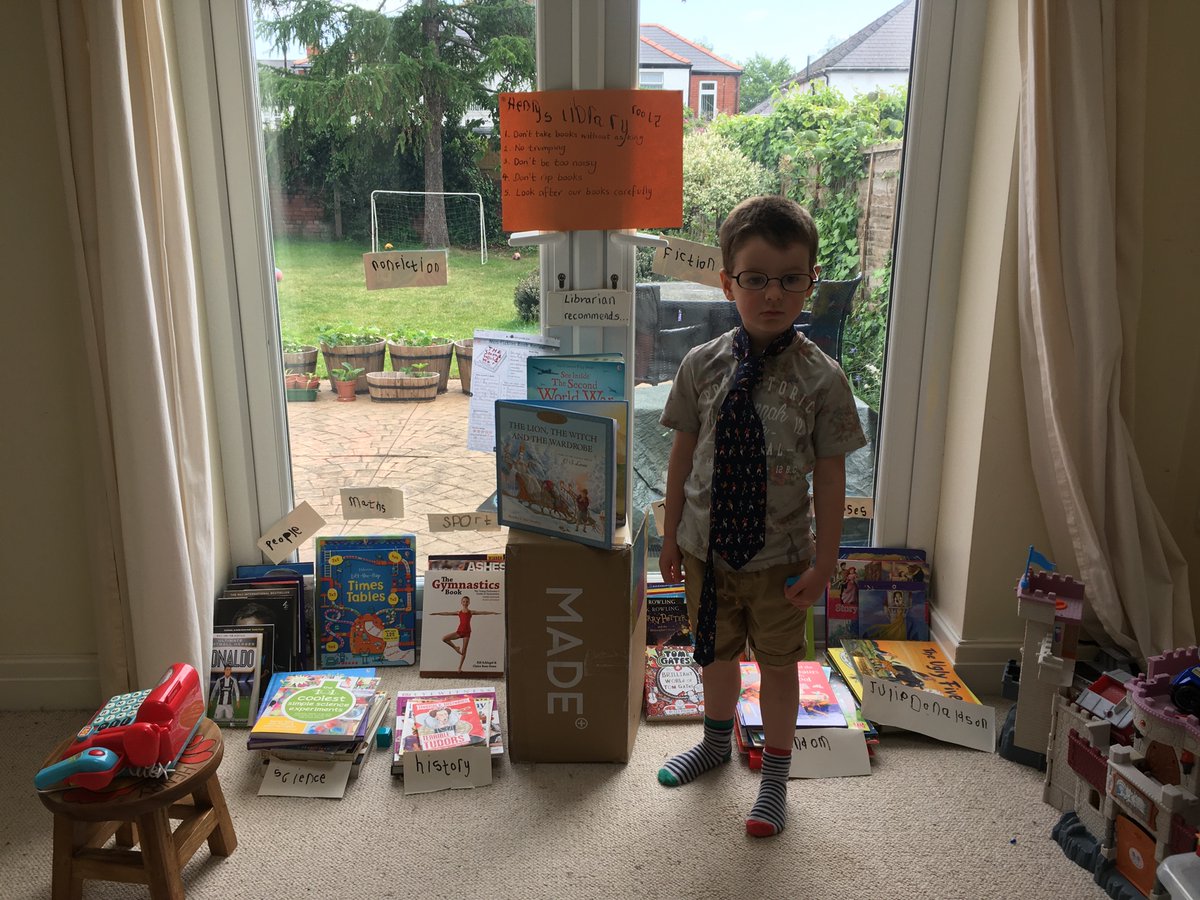 drhaynesbiol's tweet photo. Our fabulous library! Henry came up with the rules, sorted the books and made the signs. Whole family enjoyed visiting to pick the librarians’ brains on what to borrow. Then siblings took it to next level with an impromptu story time! Great task @RhiwbeinaPrm https://t.co/XDUKxozfGe