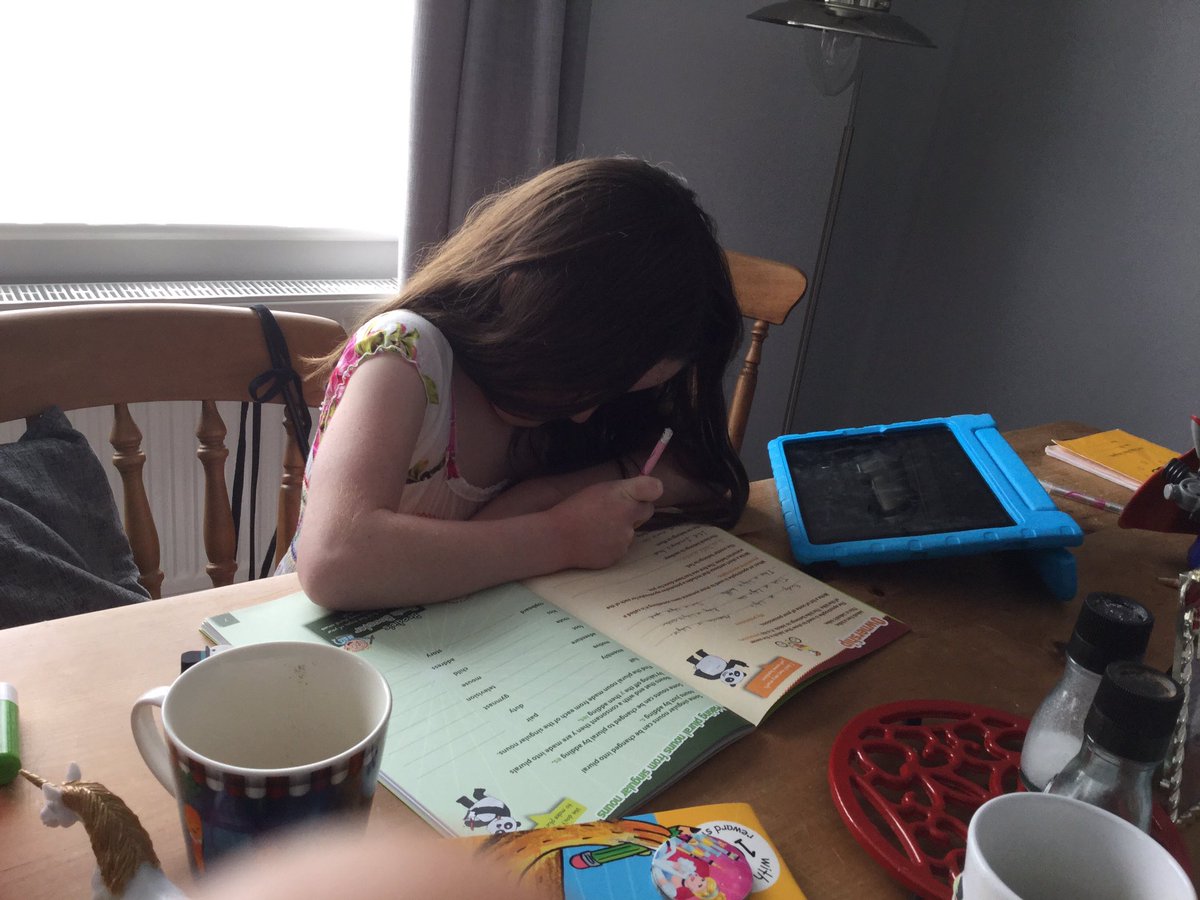 Mer229's tweet image. Lily and Ruby doing English, whilst drinking a very English cuppa! Yorkshire Leaf no less! Ruby loves hers strong! @LarchwoodPS