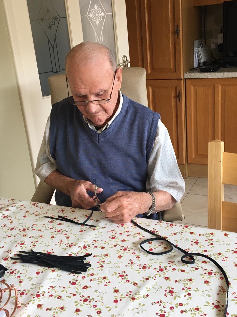 FreeMasketeer's tweet photo. #MeetTheMasketeers this is Séan, our nonagenarian #Masketeer who is prepping the ties for his daughter Helen to sew onto the masks #teamwork #thefamilythatsewstogether #FreeMasketeers @NaasBall https://t.co/nGVuHqGbMh