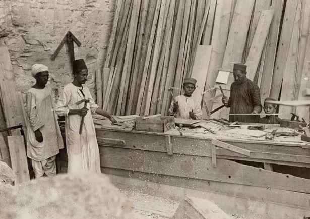 Photo of Egyptian carpenters outside the tomb making the necessary crates, trays & boxes required to safely pack & transport objects from the tomb. Read more about them in Christina Riggs’ article:  https://journals.sagepub.com/doi/pdf/10.1177/0073275316676282 Image © Rupert Wace Ancient Art