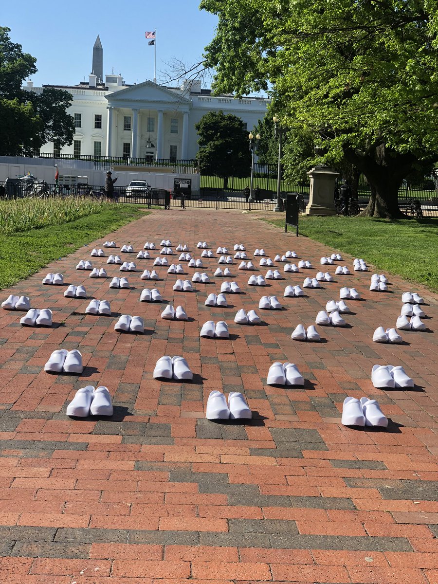 kennethzinn's tweet photo. Nurses are back at the White House at the start of Nurses Week to protest Trump’s abhorrent failure to protect nurses and other health care workers. There are 88 pairs of shoes for every nurse in the US whose name we know who has died of covid-19. Presente! @NationalNurses https://t.co/FAVz1FHTtY