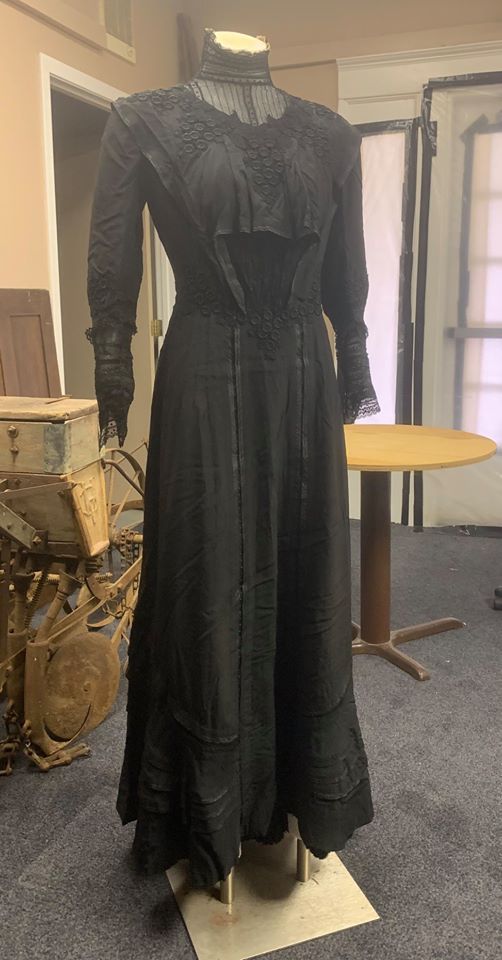 Artifact of the Day! Donated by Shirley Ballard this black silk dress with black lace inserts was made around 1865 and bought by Mrs. Mary Byers for $25 (about $425 today). It Artifact of the Day! Donated by Shirley Ballard this black silk dress with black lace inserts was made around 1865 and bought by Mrs. Mary Byers for $25 (about $425 today). It