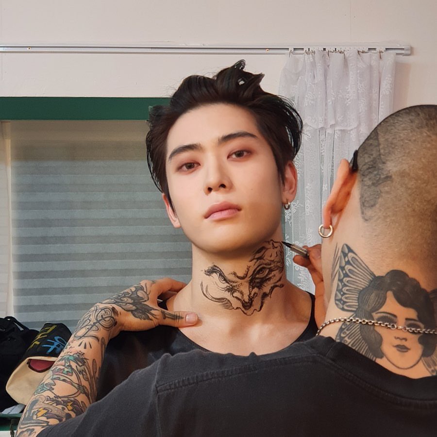 suhø's hawaii shirt™ on X: jaehyun posting these thirst trap photos with  the caption Ain't .. Real .. Tattoos whilst taking that lip bite emoji to  the next level who allowed him