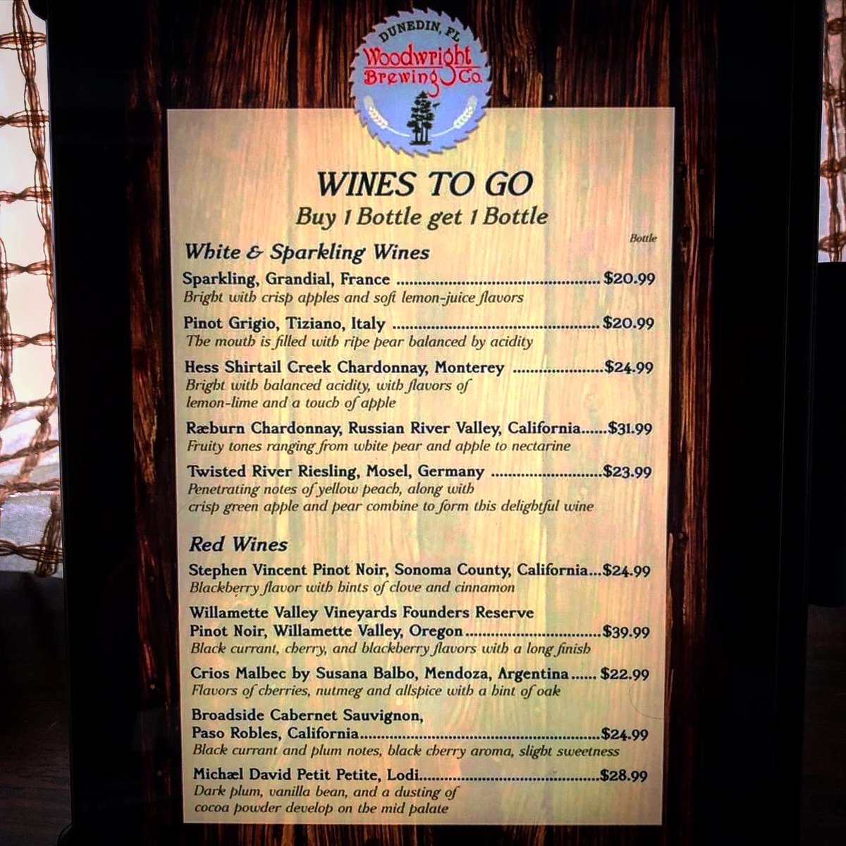 WoodwrightBrew's tweet photo. Our to-go menu has continued to expand. New for this week: 32oz Crowlers of our Hefe &amp; IPA for only $12 (while supplies last). We’re also offering BOGO on bottles of wine! See all photos for our menus for Beer, Wine, and Hats. Call (727) 238-8717 to place your order today 2-6pm. https://t.co/ne4uawwAi5