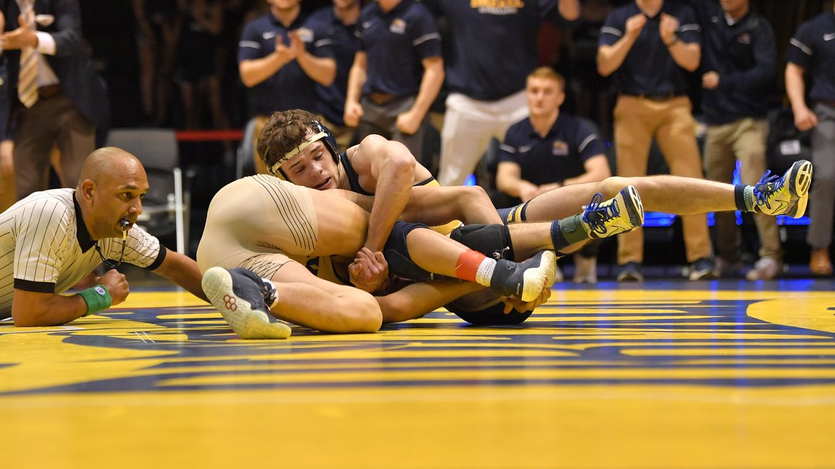 Nick Widmann won in thrilling fashion against Navy with a takedown in sudden victory for a 6-4 decision