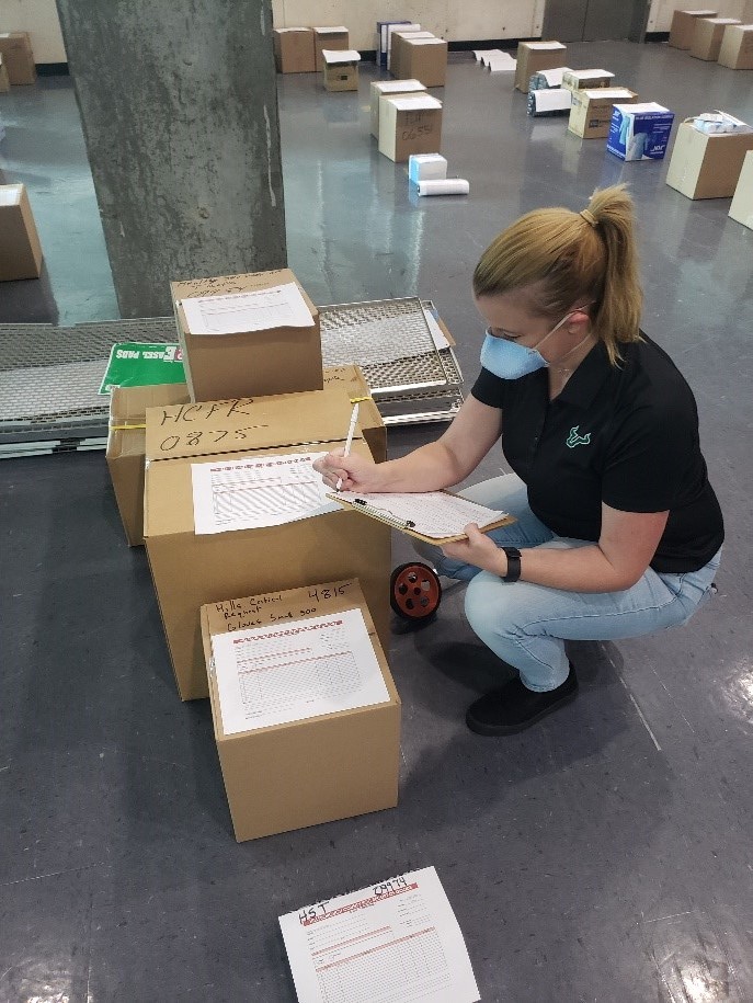 usfcoph's tweet photo. Elizabeth Dunn, #USF COPH instructor, helped to address the #COVID19 pandemic by volunteering at the 
@HillsboroughFL Medical Supply Procurement Warehouse to inventory #PPE for distribution to health care providers. #USFCOPHRocks! #OneUSF #PublicHealthHeroes https://t.co/2KgG8pOlDL
