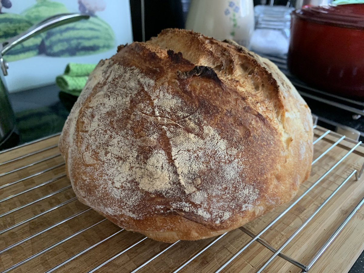 Phil_Sandford's tweet photo. 6 weeks ago I’d never baked a sourdough loaf in my life. Couldn’t get yeast, so made my own with 30g of flour and 30g water. In a week I had 200g of an active sourdough starter and, well, voila, just out of the oven, my best loaf yet. #lockdownbakery https://t.co/lirIyzdE6U