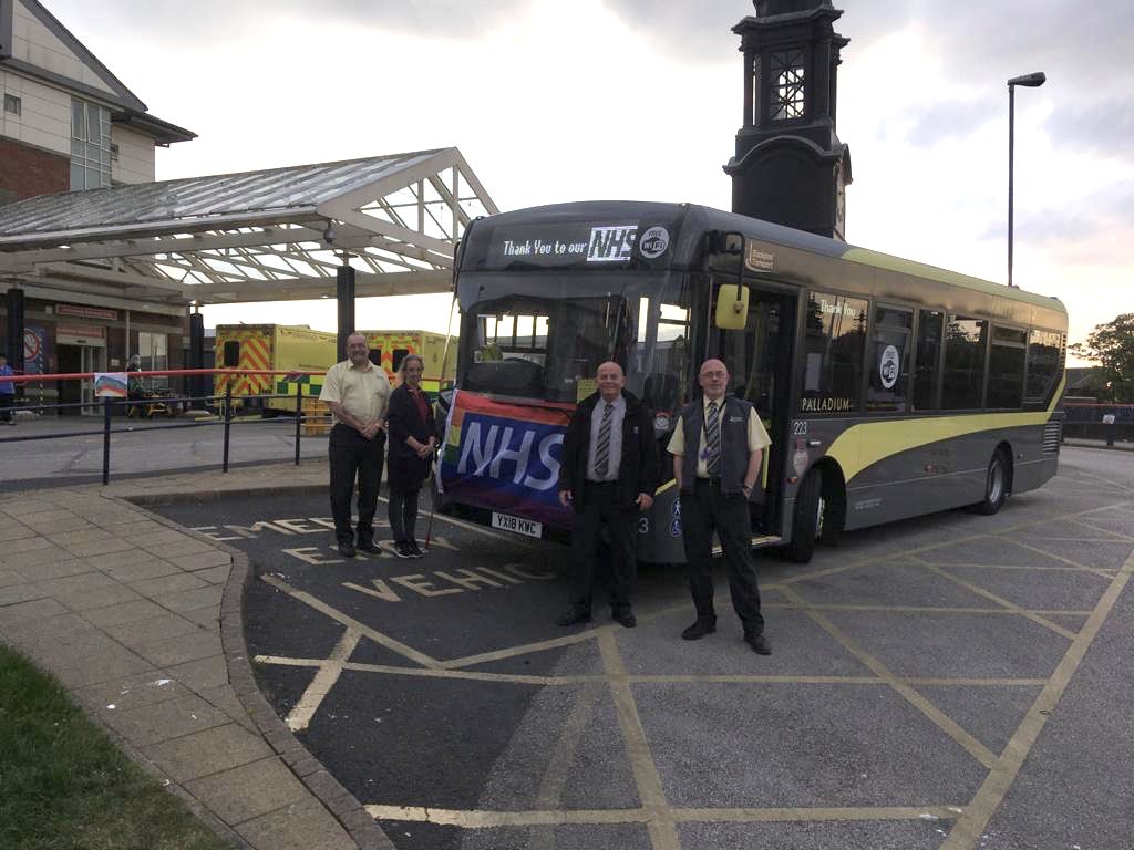BPL_Transport's tweet photo. We loved #ClapForOurCarers this evening with our bus outside Victoria Hospital. Kev, one of our drivers took his flag and his wife who is a fellow care worker too! #clapforourkeyworkers https://t.co/bgGJ38VExM