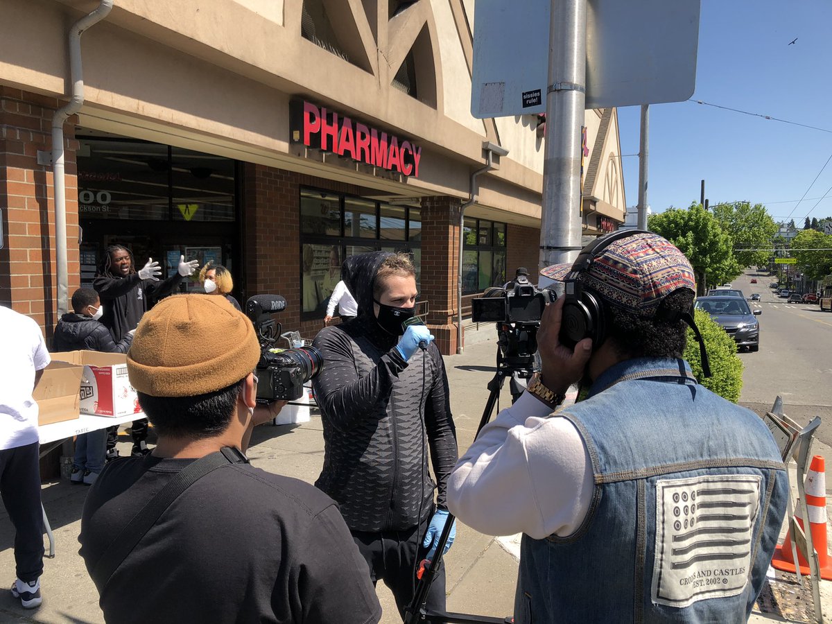 AfricatownSEA's tweet photo. #BreakingNews - Random act of kindness breaks out on in the Central District as community members hand out free meals and PPE on 23rd and Jackson to those most vulnerable. The #DefChef &amp; @wjimersonjr have been spotted. Please consider them as giving and grateful. #ZYD https://t.co/Yzv5KQaoez