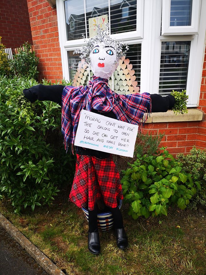 NECG2012's tweet photo. Meet Morag, flying the metaphorical flag for the Scots of Newton-le-Willows on Park Avenue South. It's not just her hair and nails that need done now. She needs a whole face lift after that rain ☔😂 https://t.co/LYKG4oMBPr