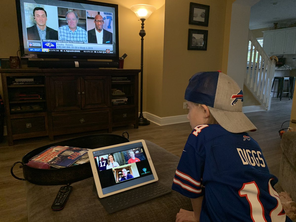 DoctorAltieri's tweet photo. My boy taking in all the NFL schedule talk...so ready for @BuffaloBills football! Hyped for @stefondiggs in the red, white and blue. #GoBills https://t.co/R1KbMCwY3x
