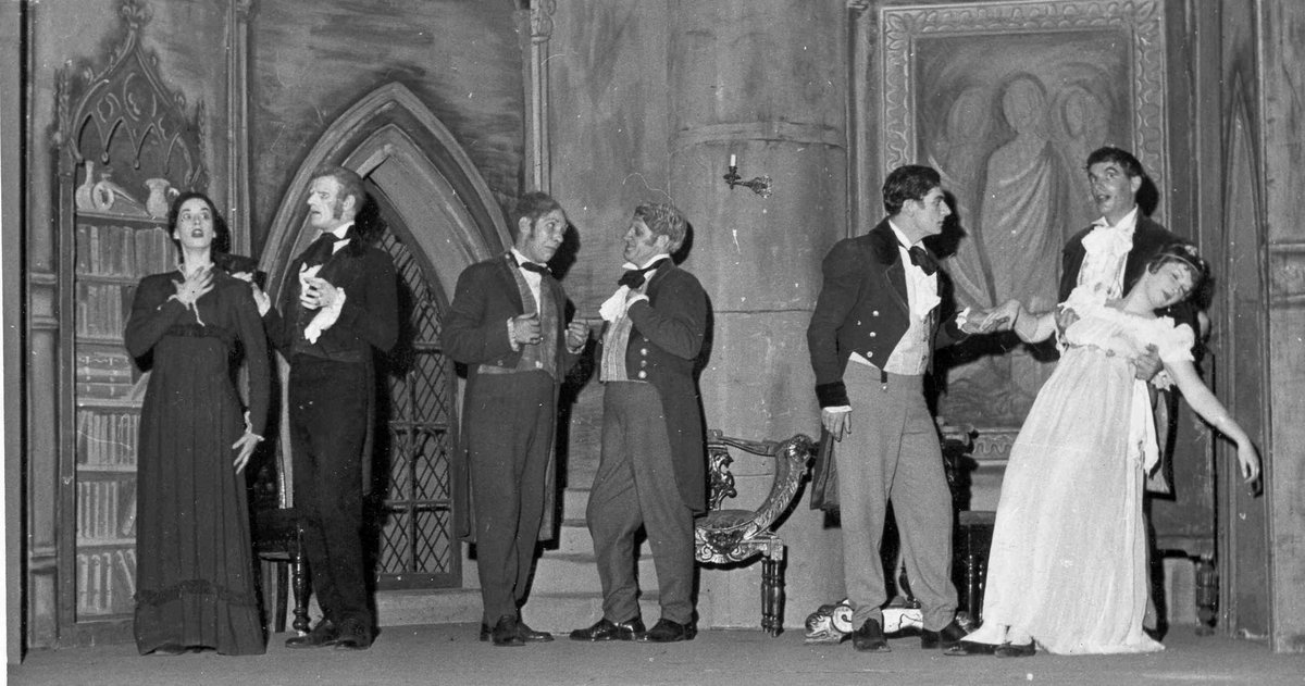 genesians's tweet photo. For Gabrielle Merten in #GenesianPhotoRequests today we have #NightmareAbbey a frolic by #ThomasLovePeacock produced by #JamesLang in 1955! Gabrielle worked on props for the show and did the poster. Apparently Jim wanted a live raven but had to settle for a stuffed one! π https://t.co/iVpVBP0Pdd