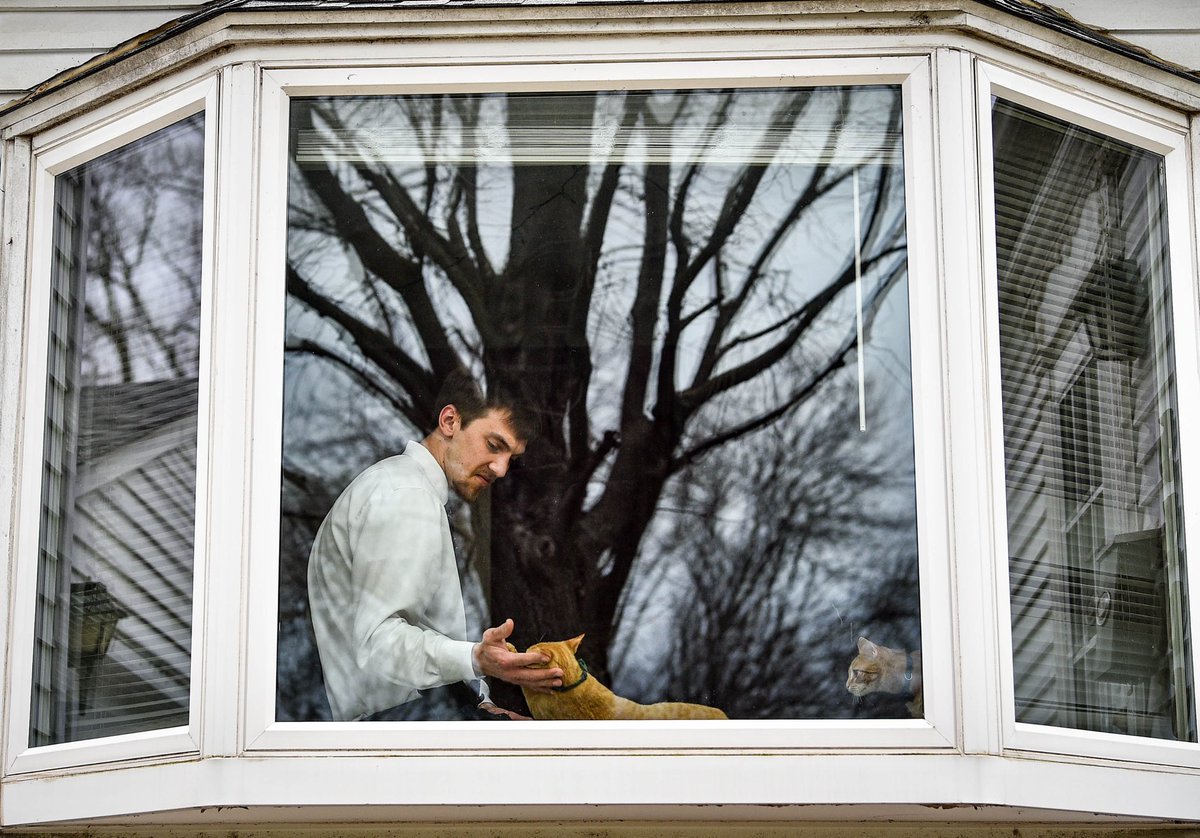 Over the last month @JessGallDA &amp; I really wanted to visualize what the sheltering in place looked like in the Quad-Cities. We decided photographed people through their windows. 

Take a look at our gallery here: bit.ly/2YGdrLz