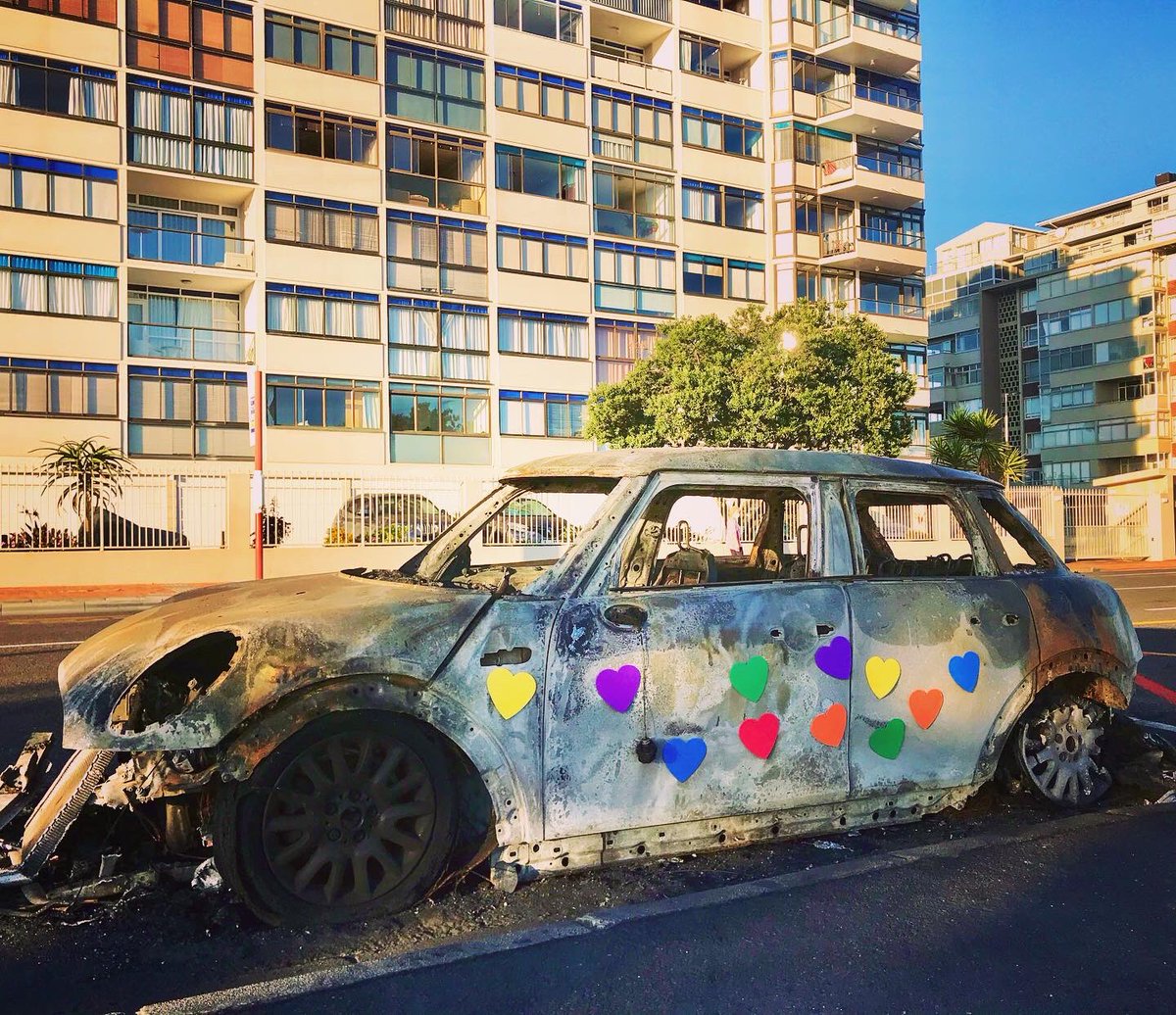yoursunplace's tweet photo. Love prevails! Torched car gets shown some love from passersby. Owner is feeling the love and support from the community. ♥️ #COVID19 #COVID19SouthAfrica #Ubuntu @News24 @IOL @CBC #COVIDnews https://t.co/K4AoMwW1D9