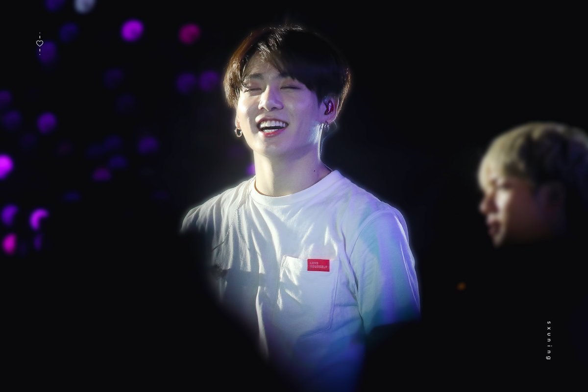 jungkook with army bomb ocean in the background - a thread ♡