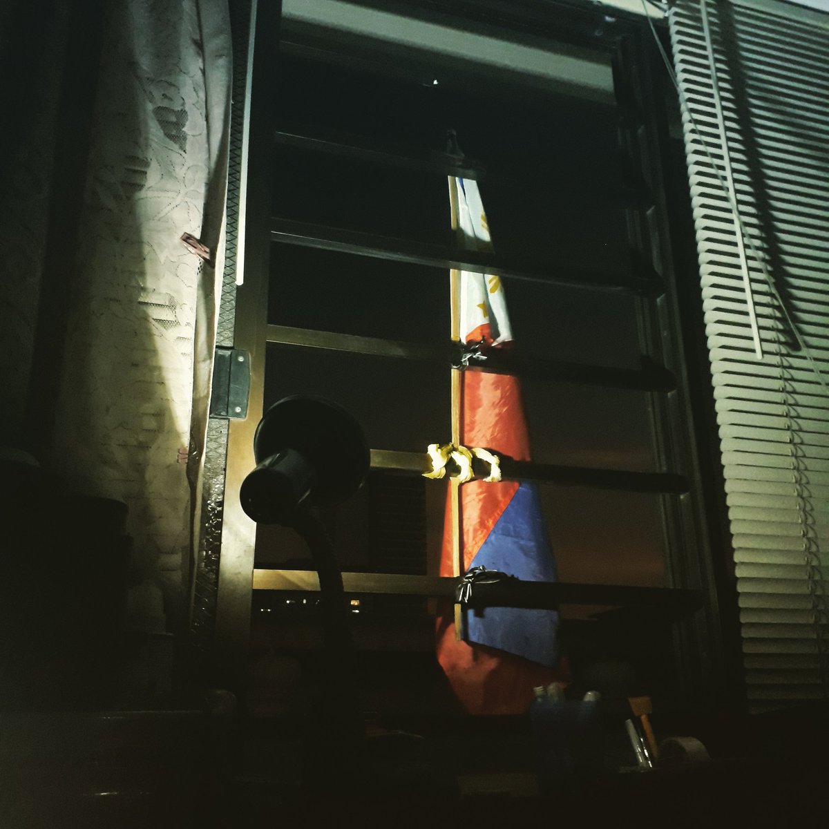 eufems's tweet photo. My Philippine flag is illuminated in protest against the ABS-CBN shutdown. This is our equivalent of lighting a candle.

#DefendPressFreedom 
#NoToABSCBNShutDown 
#SaveABSCBNworkers
#LabanKapamilya
#LabanPilipinas https://t.co/KOXzI2hc3s