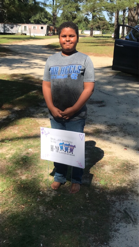 CaseyIn3rd's tweet photo. With @RachaelMP88 going out to visit more of our former &amp; current students! If you were wondering, here's a sign to remind, you are valued, smart, missed, &amp; totally amazing! @Dolphinville https://t.co/oYkku3hP5h