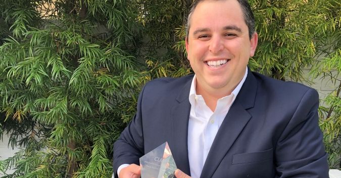 TheCLMalliance's tweet photo. Help us continue to applaud remotely for Alex Chazen, @KahanaFeld, winner of the 2020 CLM Professionals of the Year Award for Young Outside Counsel. Thanks for sending us a snapshot of you with your award (sorry about the confusion when your wife saw the Tiffany's box!). #CLM2020 https://t.co/DFlEGp17LE