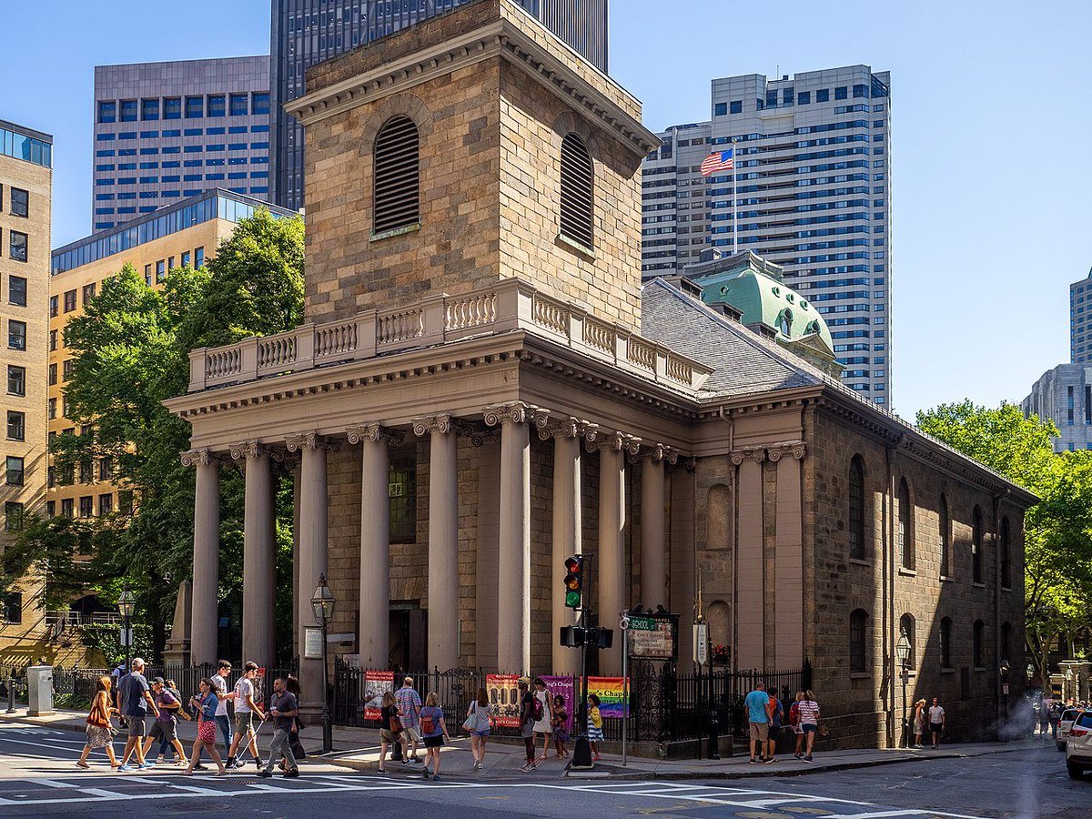 the other major colonial era church in the city is King's Chapel, which is in stone and in a more straightforwardly classical style, but with a curious history: this one was built in 1754, around the still-standing wooden church...